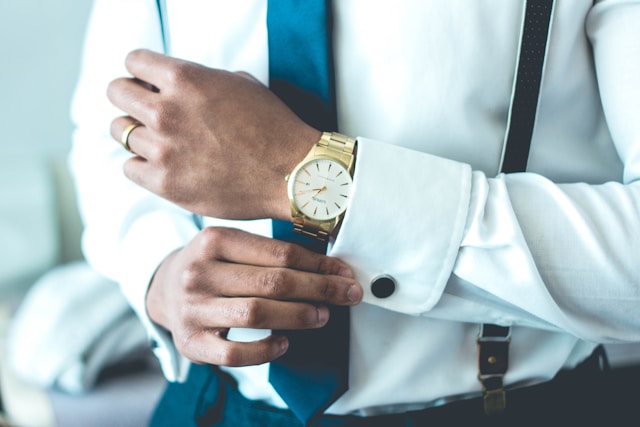 business man adjusting suit